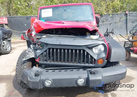 2011 Jeep Wrangler Sport z USA, uszkodzony, nr VIN 1J4AA2D10BL503264